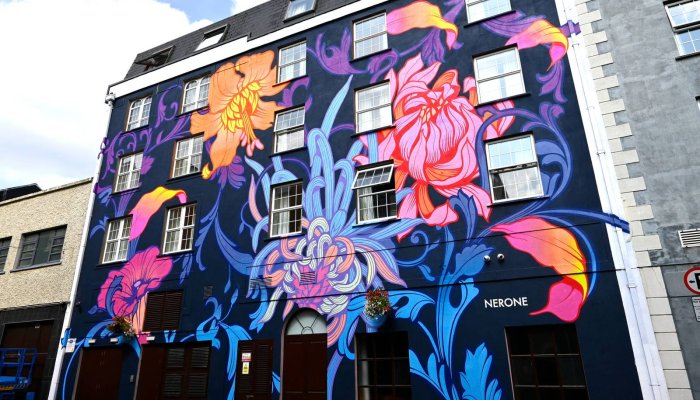 Nerones Mural at Dooleys Hotel featuring bright flowers. 